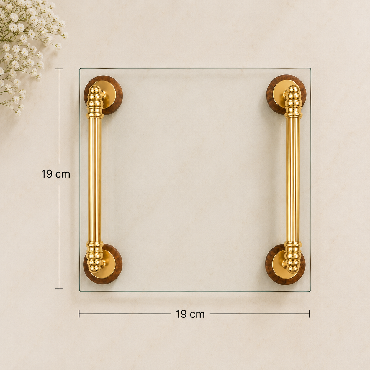 Luxury tempered glass serving tray with gold metal handles and wooden ball feet for serving drinks, desserts and home décor. Luxury Glass Serving Tray with Gold Metal Handles