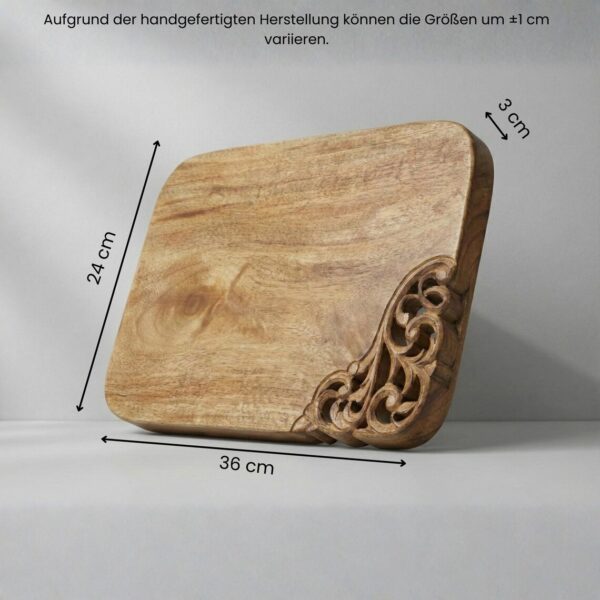 Handcrafted wooden decorative chopping board with elegant carved corner design for kitchen cutting and serving.