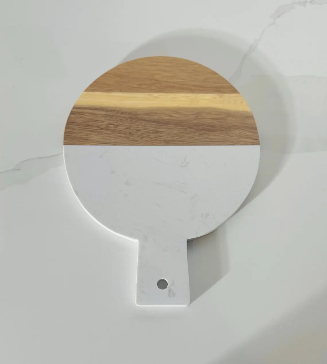 Round wooden and white marble serving board with handle by HandiGlobe Round wooden and white marble serving board with handle by HandiGlobe