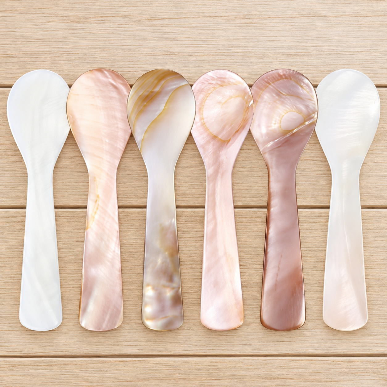 mother-of-pearl-luxury-tableware.webp Six mother of pearl caviar spoons with natural pearl shell finish