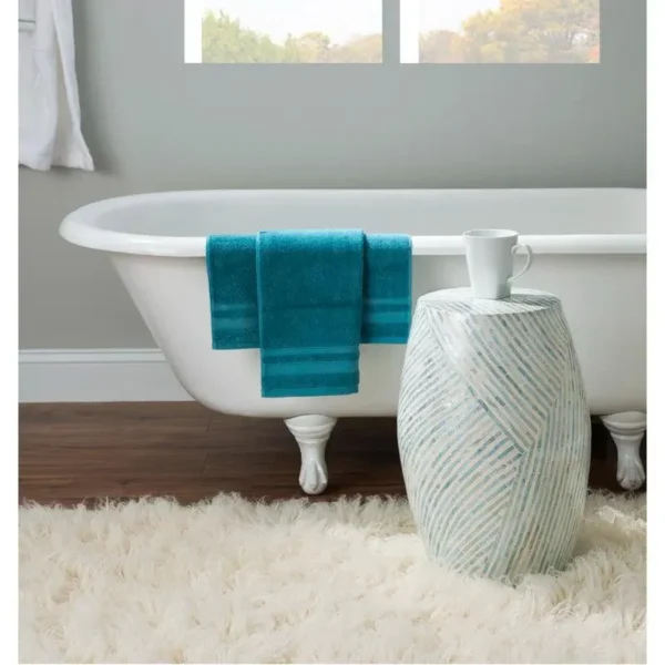 Blue cylindrical bone inlay side table featuring handcrafted striped inlay design