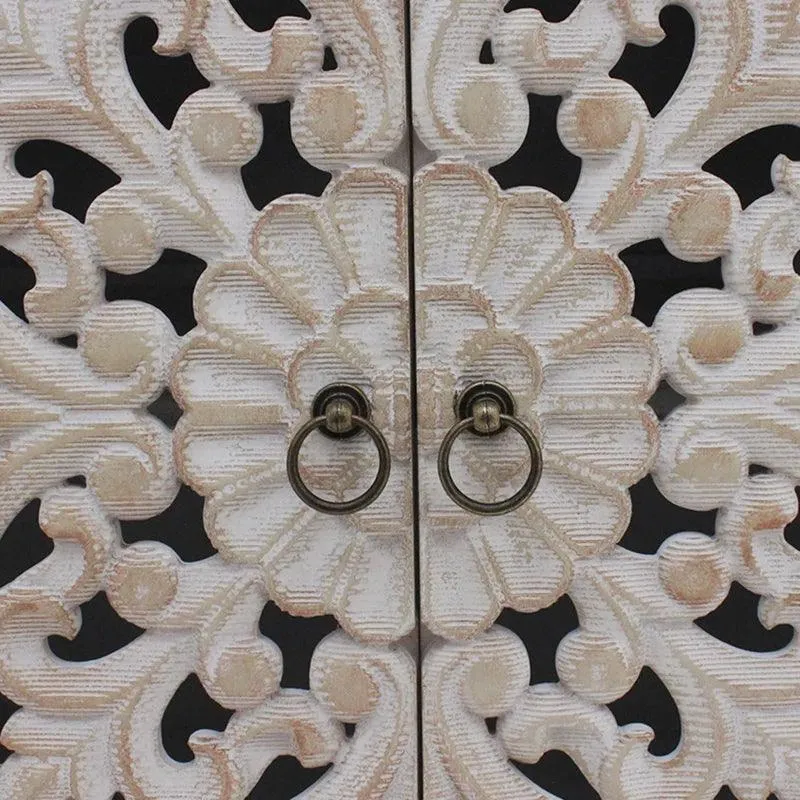 wooden-accent-cabinet-front.webp Luxury handcrafted solid wood cabinet featuring detailed floral carving and double doors