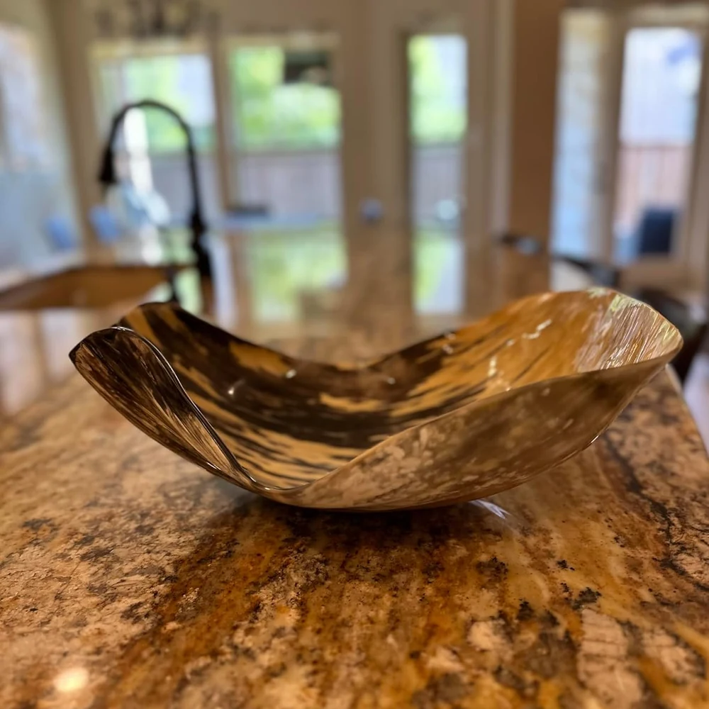 luxury-natural-horn-bowl.webp Luxury handcrafted natural horn bowl with sculptural curved design