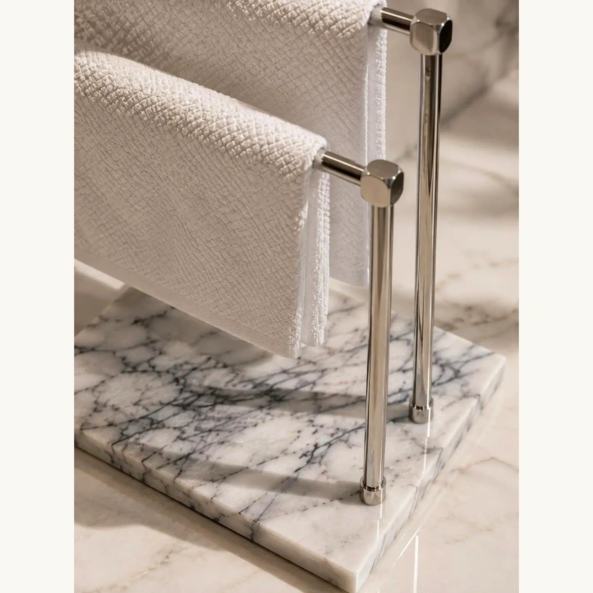 Freestanding marble towel stand in luxury bathroom Freestanding marble towel stand in luxury bathroom