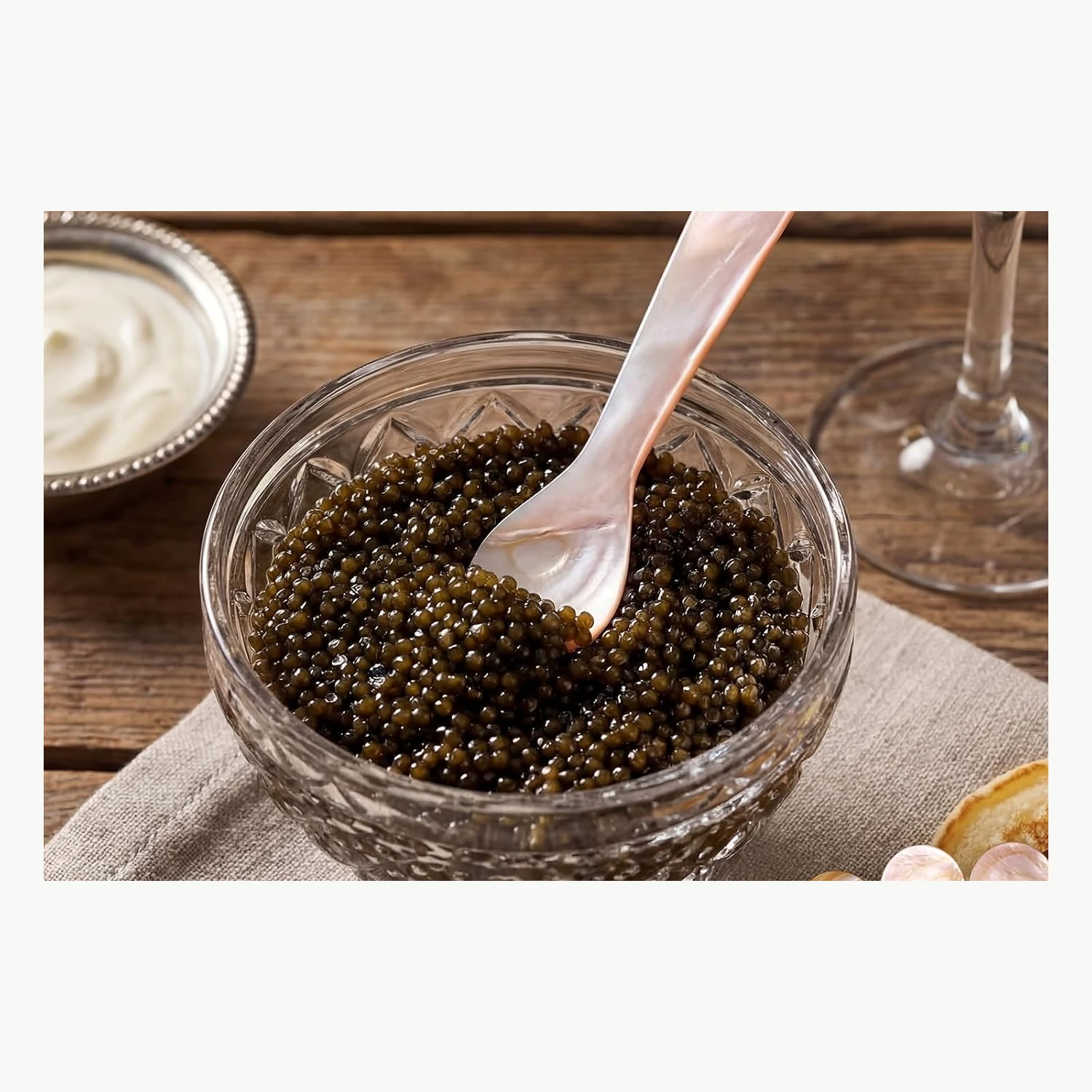 mother-of-pearl-caviar-serving-spoon.webp Mother of pearl serving spoon with natural shell texture