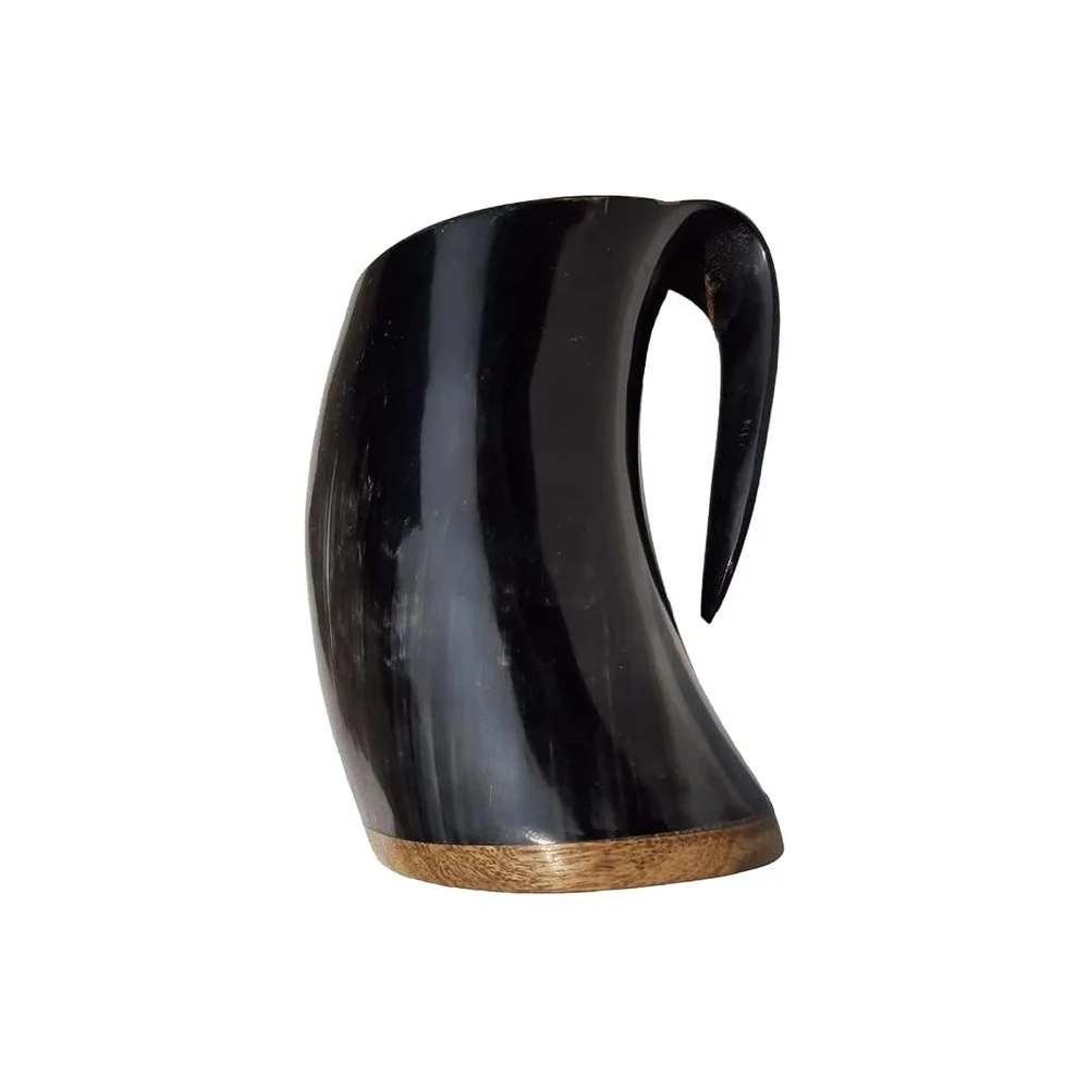natural-horn-viking-mugs-engraved-design.webp Collection of handcrafted natural horn Viking mugs with engraved designs